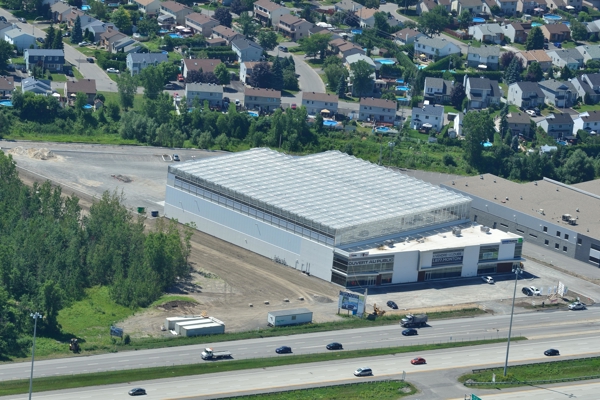 Greenhouse for growing vegetables on roof of company in canada